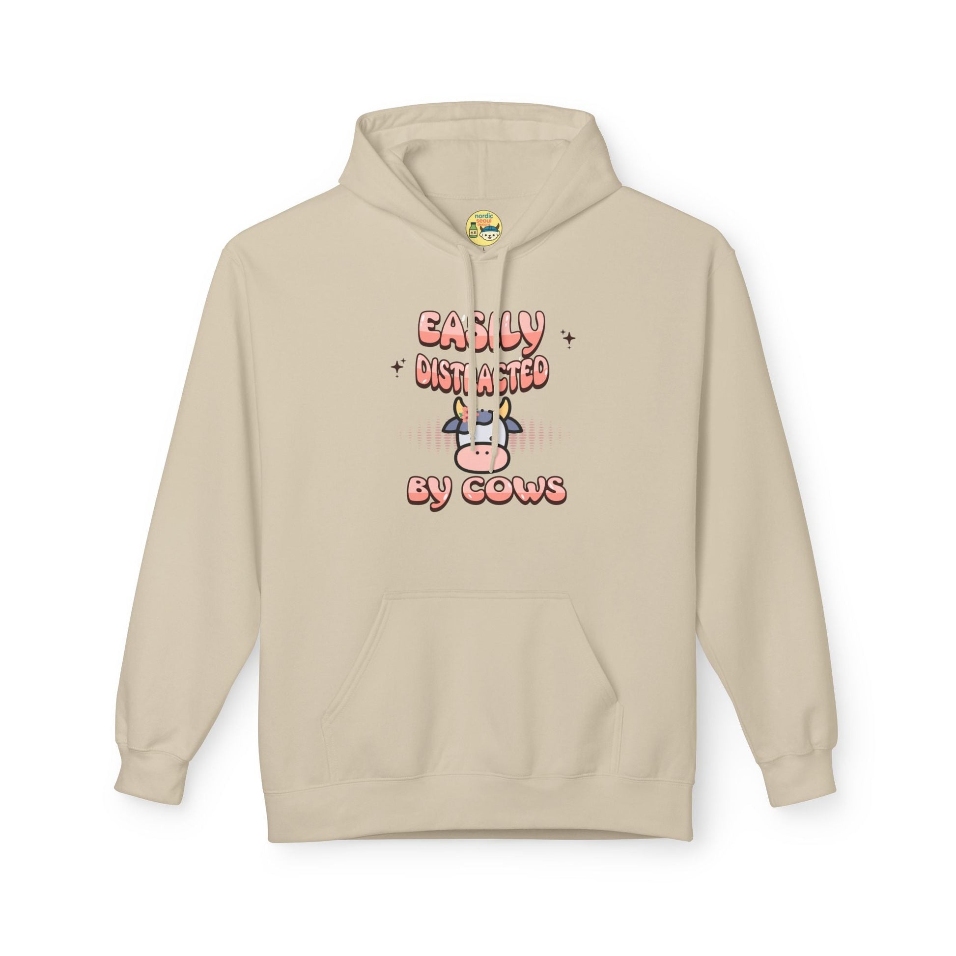 Easily Distracted by Cows Hoodie – Funny Farm Graphic Sweatshirt, Cow Lover Unisex Pullover Printify Hoodie Nordic Seoul Designs LLC